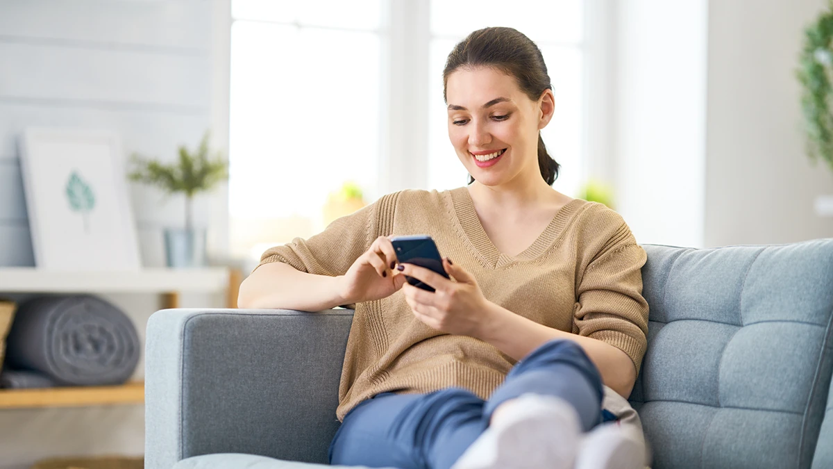 Person holding iPhone with Connect app